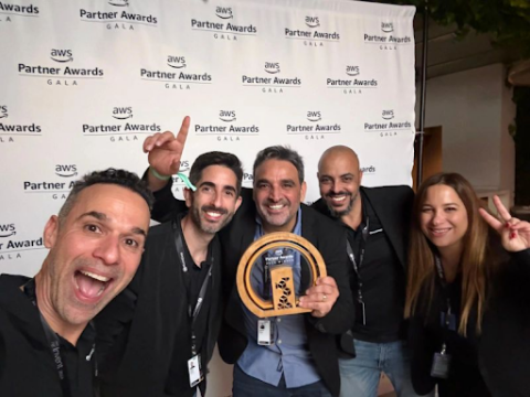 CEO David Drai celebrating the win with the Anodot team at AWS Partner Awards